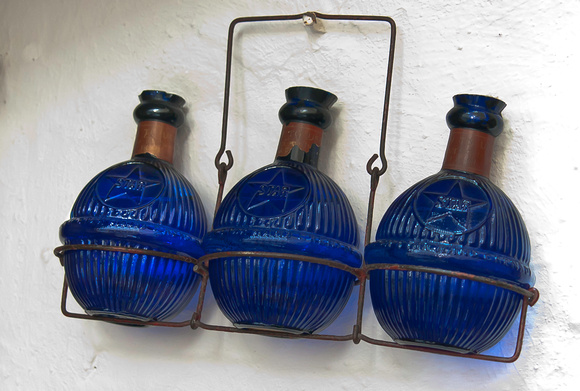 3 blue bottles